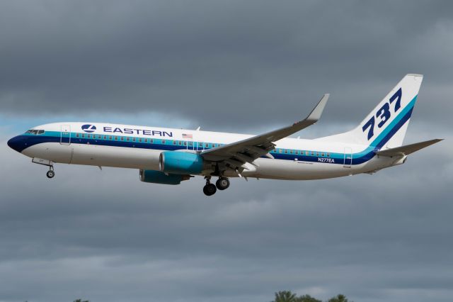 Boeing 737-800 (N277EA) - Mike Pence arriving at Pease AFB for a rally in Rochester. This was taken a couple days after his "accident" in New York so this is a replacement plane without the stickers.