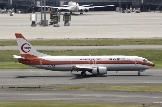 BOEING 737-400 (JA8999) - Landing at Haneda Intl Airport Rwy34L on 2013/07/20 "Old Retro c/s"