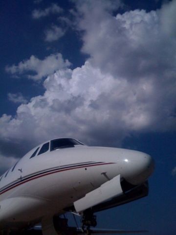 — — - Citation parked on the ramp at United States Aviation.