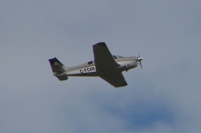 Beechcraft Bonanza (36) (C-FCAH) - C-FCAH departs Runway 14 at Sarasota-Bradenton International Airport