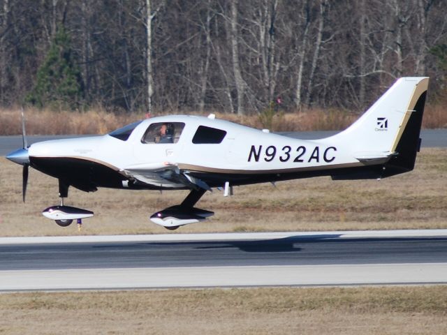 Cessna 400 (N932AC) - Landing on runway 20 at Concord Regional Airport (Concord, NC) - 2/7/09