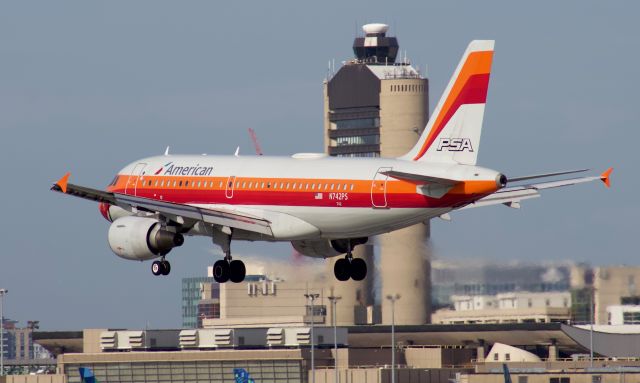 Airbus A319 (N742PS) - (8/3/2020) Smiley (The PSA Retrojet) passes over the runway 22L Piano Keys, running the DCA shuttle service.