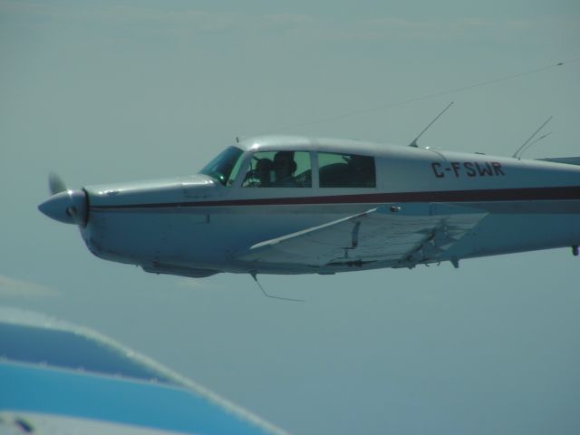 Mooney M-20 (C-FSWR) - Coming home from OSH @ 7000