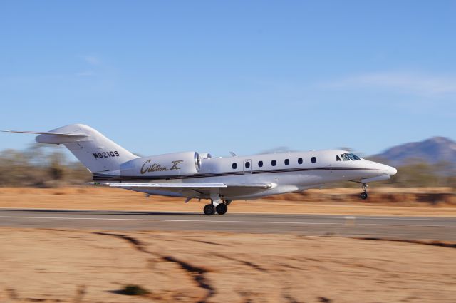 Cessna Citation X (N921QS) - When you land at Cabo San Lucas, they have a photographer taking photos of you and your aircraft.  If you give them your email they will send them to you.