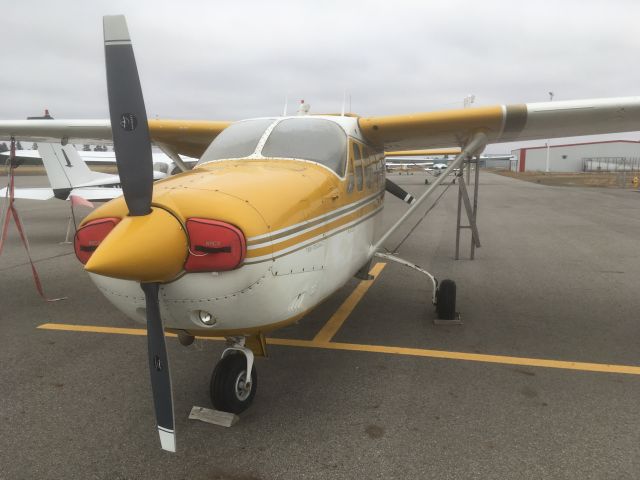 Cessna Super Skymaster (N9CX) - This is a Cessna 337 Turbo I found at, once again, KDEW, sitting on an unused taxiway that is kind of being used as a parking lot for about 30 other aircraft; you can see some of them behind it.