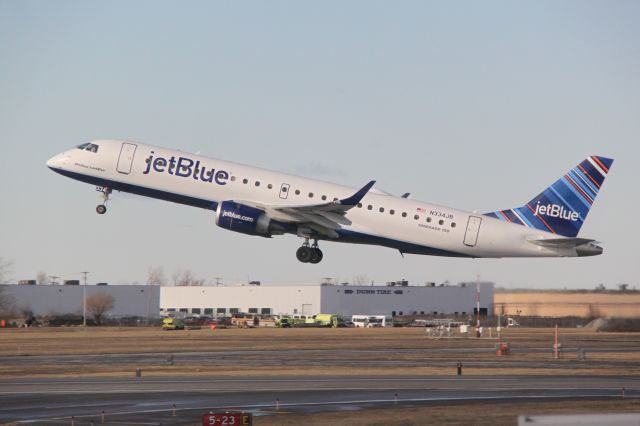 N334JB — - captured taking off at Buffalo New  York while I waited for my flight to Tampa Florida