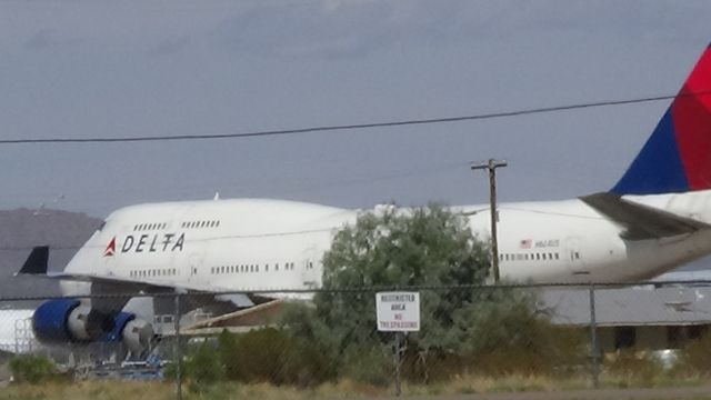 Boeing 747-200 (N664US) - Grounded after ferry flight from Korea following in-flight hail damage 6-15-2015.