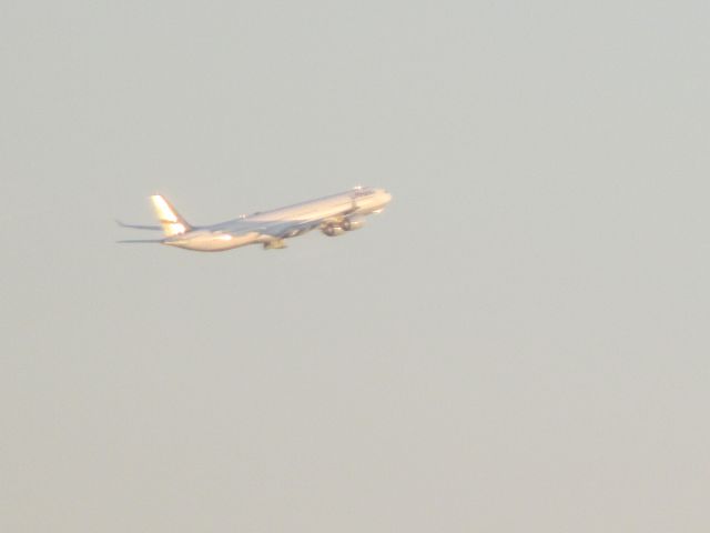 Airbus A340-600 — - Got a glimpse of a A340-600 taking off from Toronto while we were waiting for pushback! These airliners seem like they're going so slow they might stall !