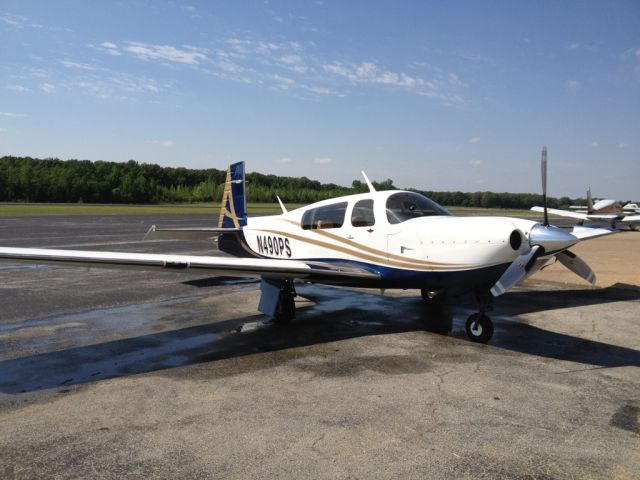 Mooney M-20 Turbo (N490PS) - Just got thru washing her down.