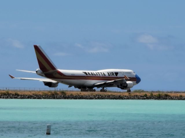 Boeing 747-400 (CKS423) - CKS423 headed to Runway 8R for departure. This particular plane is sporting a face mask, which is what caught my attention. Apologies for the low quality photo, I was out running when I saw the plane and sprinted to my car to get my phone. Had to zoom in a bit. Enjoy!