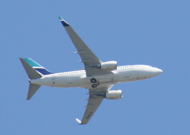 Boeing 737-700 — - westjet flight 102 flying over London before making his final approach for CYXU