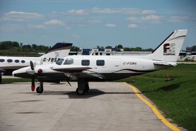 Piper Navajo (C-FGWA) - Piper PA-31T Cheyenne operating as flight # FEX4 of Flight Exec, Buttonville Airport (Toronto) July 4/08.