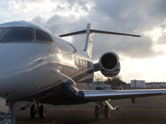 Bombardier Challenger 300 (N548FX) - Great glare on the biggest jet Ive seen ever come through KLUL. 1 day before tornado pummeled Hattiesburg, 30 miles south of here.