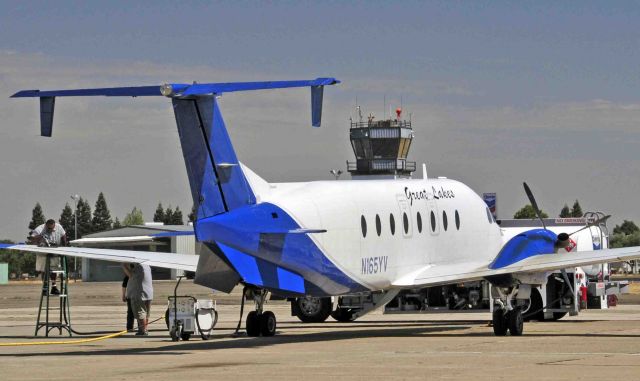 Beechcraft 1900 (N165YV) - Frank topping-off the airliner