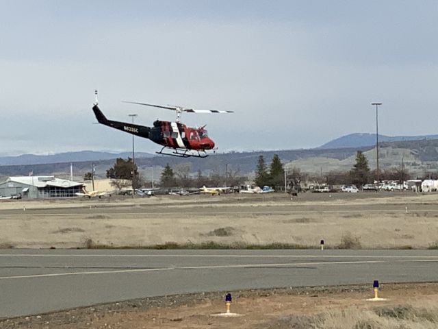 Bell UH-1V Iroquois (N633SC) - Just watching them practice.