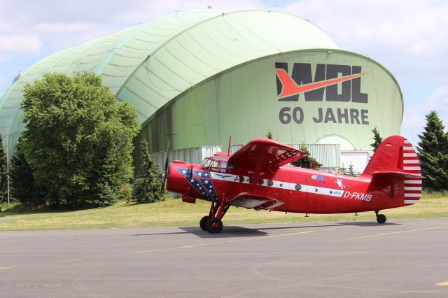 Antonov An-2 (D-FKMB) - In the background is the zeppelin hangar at Mülheim-Essen airport.