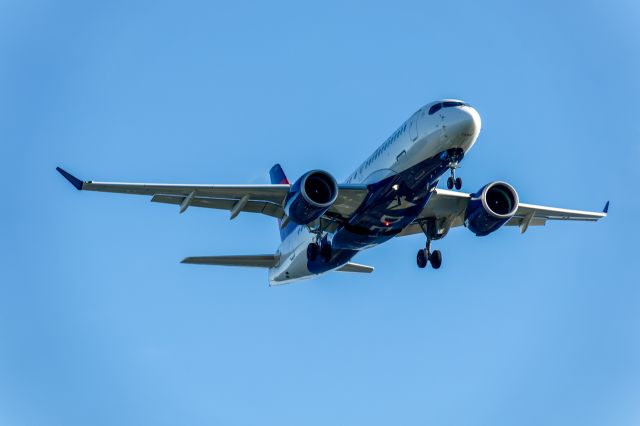 Airbus A220-100 (N121DU) - N121DU on short final for runway 27 at Boston Logan