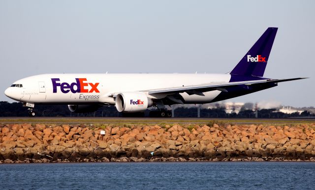 BOEING 777-200LR (N894FD) - Arriving on Rwy 34L