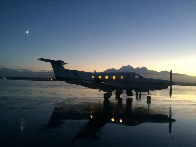 Pilatus PC-12 (N642SF) - Cold Bay Sunset behind Frosty Peak 