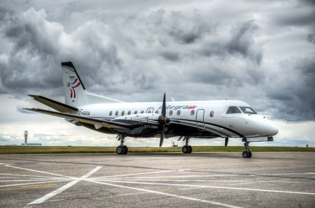 Saab 340 (C-GOIA) - Taken air-side near taxiway P at Calgary International Airport. Composed of 5 images to make this HRD. May 15 2014