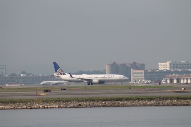 Boeing 737-900 — - A United 737-900 holding short of 4L at Logan.