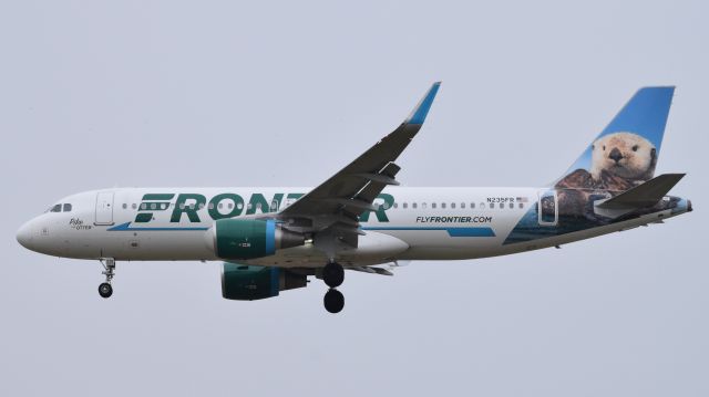 Airbus A320 (N235FR) - A Frontier Airlines Airbus A320, "Pike the Otter", landing at Philadelphia International Airport on December 11th, 2016.