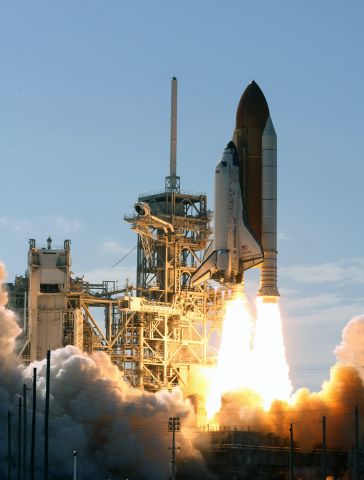 — — - At NASAs Kennedy Space Center, Space shuttle Discovery launches from Launch Pad 39A the STS-124 mission to the International Space Station.  At left is the fixed service structure with the 80-foot lightning mast on top. At far left is the open rotating service structure. Discovery is making its 35th flight. The STS-124 mission is the 26th in the assembly of the space station. It is the second of three flights launching components to complete the Japan Aerospace Exploration Agencys Kibo laboratory.  Photo credit: courtesy of Scott Andrews.  Released into the public domain by NASA.