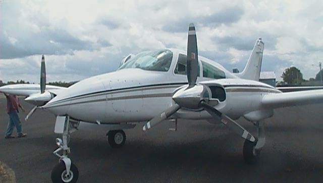 Cessna 310 (N7667Q) - Here is a Cessna 310 parked at 4B8 before the pilot takes my friends and I for a ride.