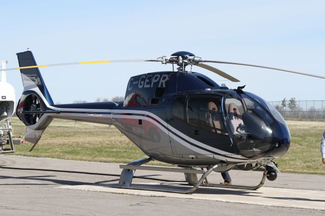 Eurocopter EC-120 Colibri (C-GEPR) - This striking Eurocopter, owned by Enbridge Pipelines, was seen outside the AOG Helicopter service facility on Kingston Airport (Ontario, Canada)