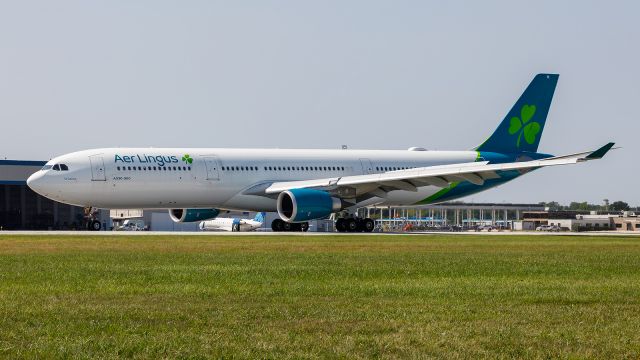 Airbus A330-300 (EI-EIN) - Aer Lingus A330-300 getting ready to pull off the runway and begin its taxi towards the ramp at Corporate Wings.