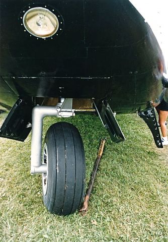 FAIRCHILD (1) Packet (N9701F) - Nose landing gear of a  very rare Fairchild C-82 Packer at the EAA Fly In. Love seeing these rare aircraft.