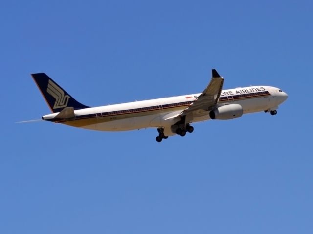 Airbus A330-300 (9V-STQ) - Getting airborne off runway 23 and heading home to Singapore. Monday 19th Dec. 2011