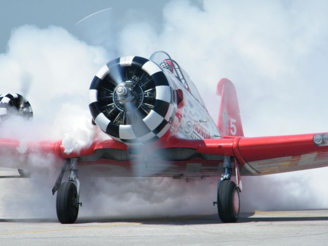 North American T-6 Texan — - Aeroshell throwing some smoke - 2011 Thunder On the Lakeshore.