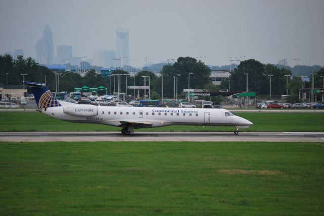 Embraer ERJ-145 (N26545) - Rolling down runway 18C - 6/17/09