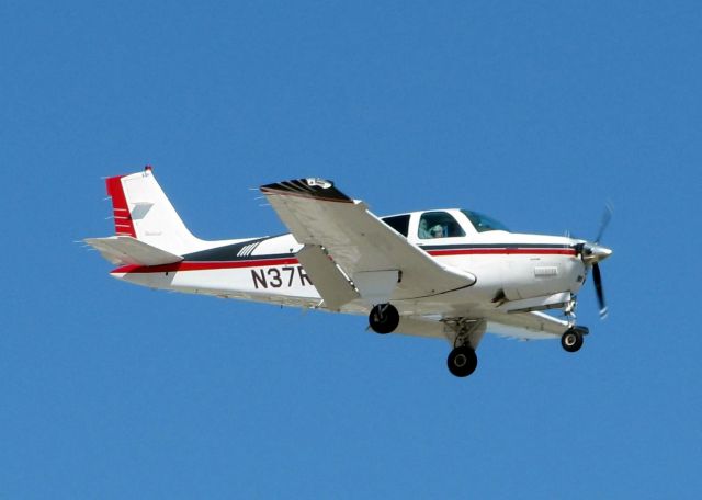 Beechcraft Bonanza (36) (N37RC) - Landing on runway 05 at Shreveports Downtown Airport.