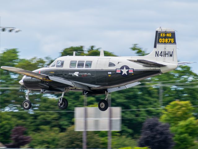 Beechcraft Queen Air (65) (N41HW) - Beautiful Beechcraft U-8F Seminole landing in Charlevoix Michigan on a Sunday morning 