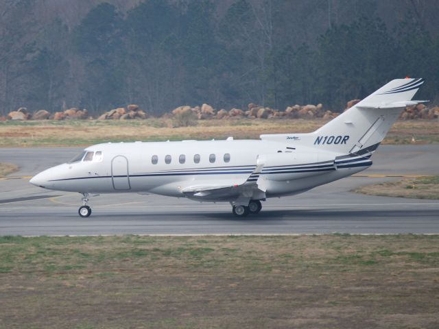 Hawker 800 (N100R) - NASCAR Corporate departing runway 20 - 3/18/09