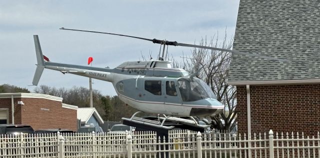 Bell JetRanger (N71SP) - DOVER, DELAWARE, USA-MARCH 22, 2025: Seen by RF in front of the Dover State Police Museum is the department's very first helicopter, a Bell Jet Ranger,   now on public display. This helicopter was acquired in February of 1971. 