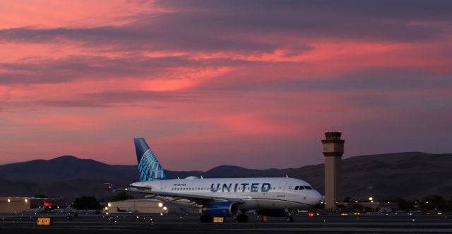 Airbus A319 (N879UA) - Taxiing out for a sunset-hour departure to KSFO.