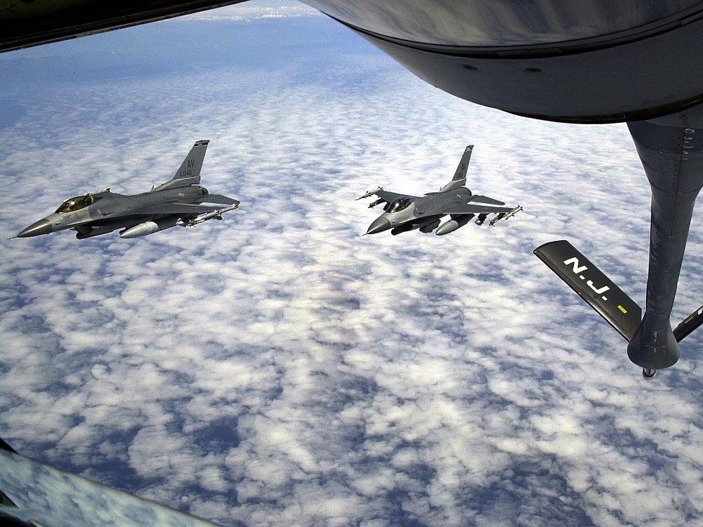 Lockheed F-16 Fighting Falcon (AWEF) - This photo was taken near Teterboro. There are actually three F-16s, one is out of the shot.