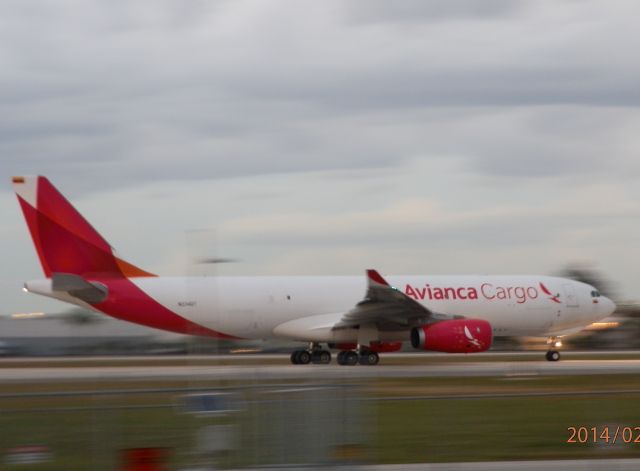 Airbus A330-200 (N334QT) - Dashing down the runway!