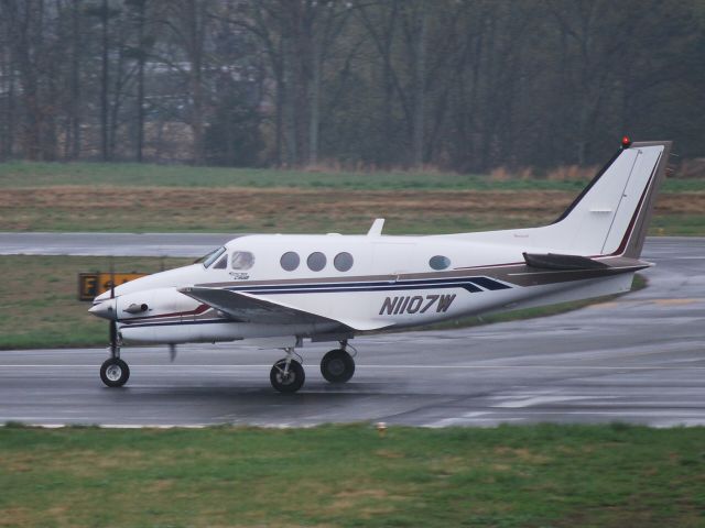 Beechcraft King Air 90 (N1107W) - Rolling down runway 20 KJQF - 4/1/09