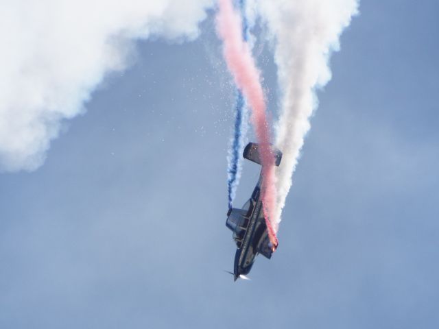 — — - Red, White, and Blue smoke, showing pride for the USA.