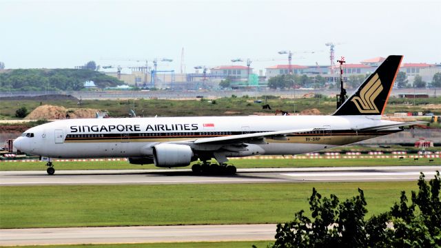 Boeing 777-200 (9V-SRP) - 9V-SRP taking off from Runway 02R. This photo was taken at T4 Carpark 4A which is now sadly off limits for planespotters :(