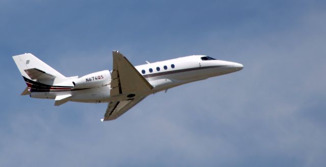 Cessna Citation Latitude (N674QS) - Shortly after  departure is this 2019 Cessna Citation Latitude 680A in the Summer of 2022.