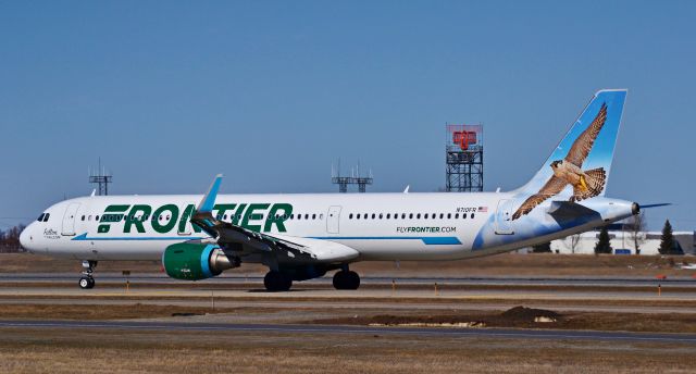 Airbus A321 (N710FR) - Frontier Airlines A321 taxing for departure on 12R on its way to Florida, taking vacationers from Minnesota. 