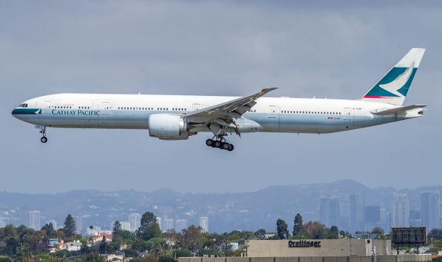 BOEING 777-300 (B-KQM) - CPA884 arrives from Hong Kong, on short finals for runway 24R at LAX