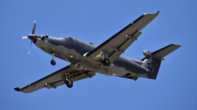 Pilatus PC-12 (05-0424) - USAF Pilatus U-28A, assigned to the 318th Special Operations Squadron, performing touch and gos on RWY 17L at Colorado Springs Airport