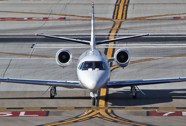 Cessna Citation Excel/XLS (N134FM) - Taxiing at the LAX.