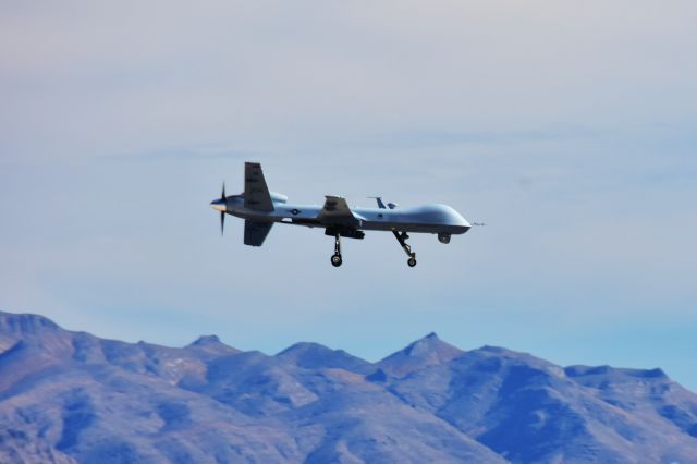 — — - MQ-1V unmanned aerial vehicle shooting touch and go at Creech AFB Indian Springs Nevada